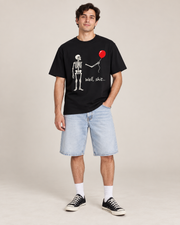 Skeleton Holding Red Balloon Graphic T-Shirt – Funny Unisex Black Tee